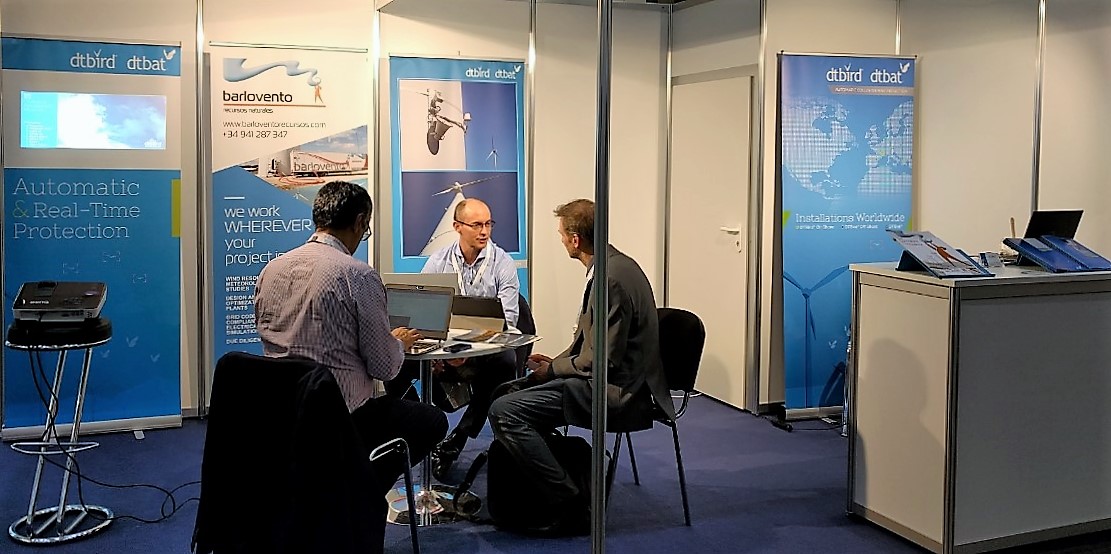 DTBird & DTBat stand at WindEnergy Hamburg 2018 with visitors discussing system upgrades.